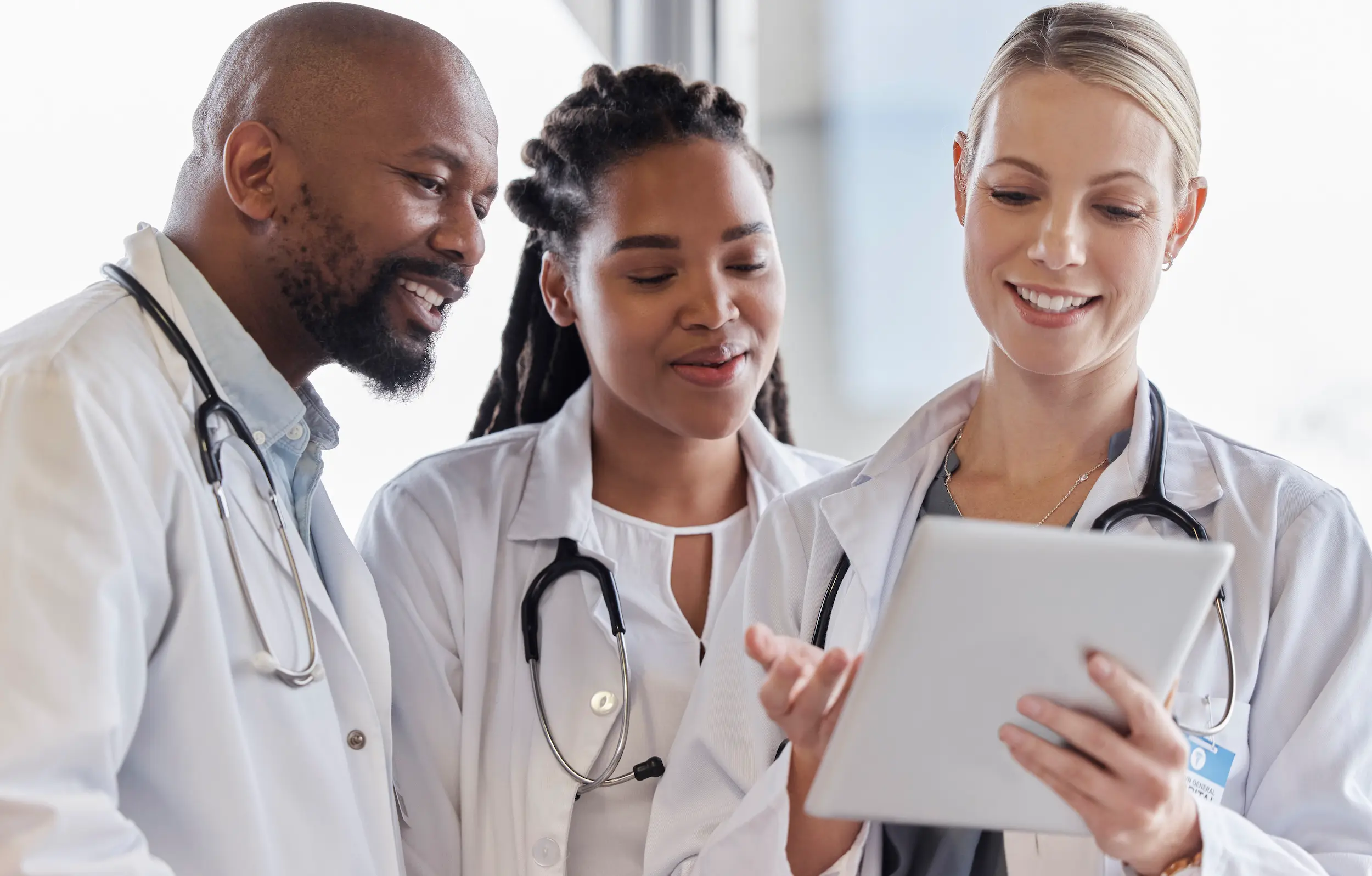 medical professionals collaborate using tablet in 2026 01 09 10 35 00 utc